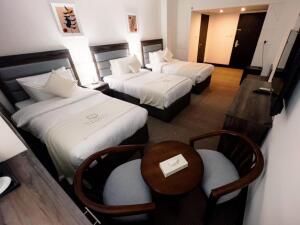 Petra_Castle_Hotel_camera_tripla